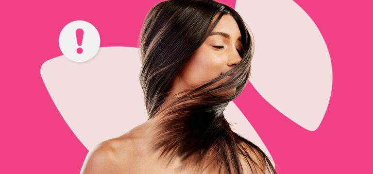 Mulher com cabelo longo em fundo pink claro.